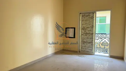 Two rooms and a living area with a balcony, located in Industrial Area 2 behind Emirates Markets.