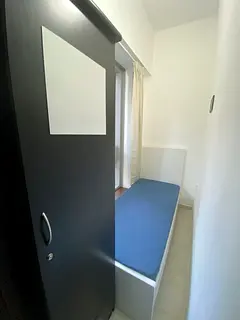 Room with open window near business bay metro station