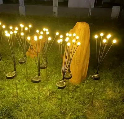 Set of solar LED garden stake lights — decorative warm white bulbs (8 pieces)