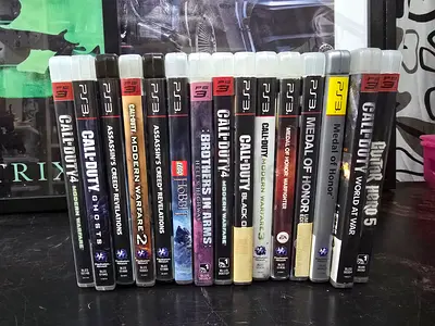 Bundle of 14 PS3 Games – Call of Duty, Assassin's Creed, Medal of Honor, Guitar Hero