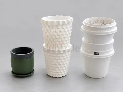 Set of plastic plant pots and planters - various sizes, used