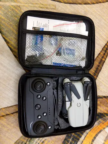 Compact foldable drone with controller in hard case but doesn't fly that  high