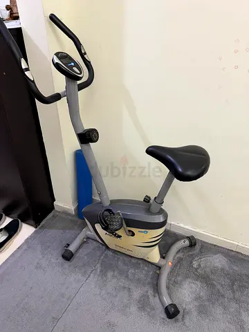 Used stationary exercise bike - adjustable tension and seat height