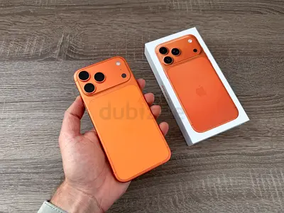Apple iPhone (orange) in original box — good condition