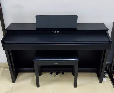 The Yamaha Clavinova CLP-625 is a discontinued entry-level console digital