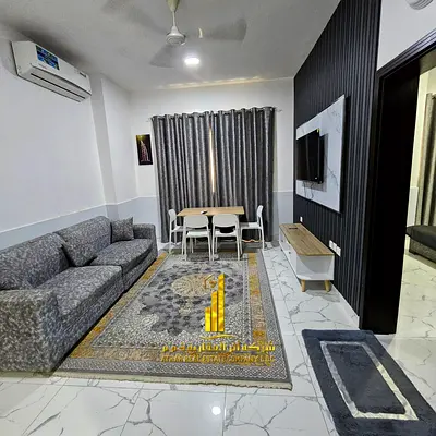 🏡 A luxurious and high-end, fully furnished one-bedroom apartment (with a living room) available for monthly rent on Al-Hassan Al-Basri Street—locate