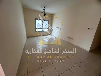 Spacious 2BR with Balcony & Central AC in Umm Tarafa