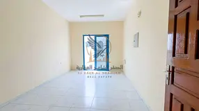 1BR Apartment for Annual Rent with 2 Balconies and Central AC Near Ajman University Etisalat and All