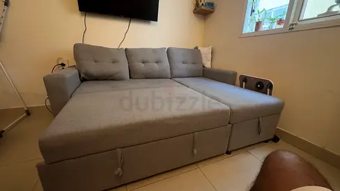 Grey L-shaped Sofa Bed with Storage - Good Condition