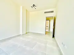 No deposit Brand new 1bhk 1washroom with balcony with parking no deposit Tilal city Sharjah