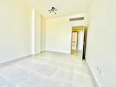 No deposit Brand new 1bhk 1washroom with balcony with parking no deposit Tilal city Sharjah