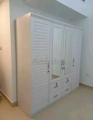 White 4-Door Wardrobe with Mirror and Drawers - Good Condition