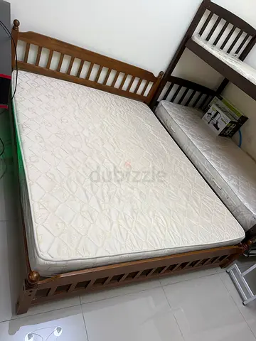 Selling a used good quality wood queen sized bed with mattress