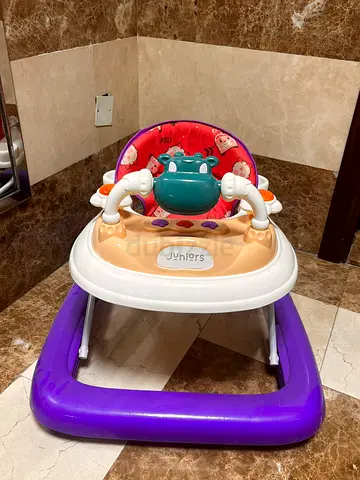 Used baby walker/jumper seat - sturdy purple frame, good condition