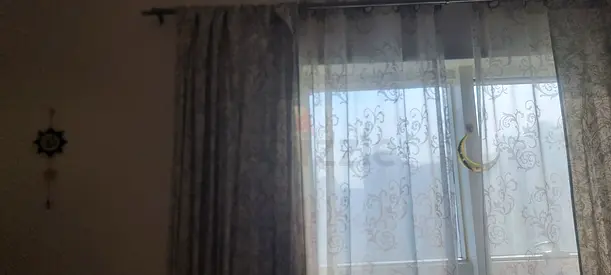 Light-filtering floral sheer curtains with grey blackout drapes - set