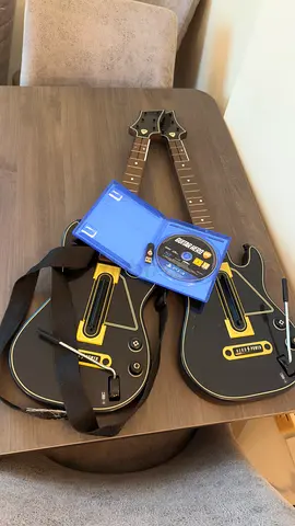 Pair PlayStation Guitar Hero 2 Controllers with Guitar Hero Disc - 1 USB
