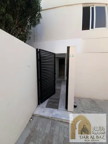 A distinctive villa for annual rent in Al Jazat, Sharjah. It features 3 bedrooms, a spacious living area, a master maid’s room, a kitchen, and 4 bathr