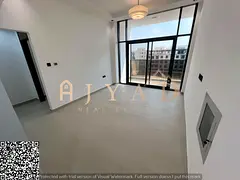 Annual rent in Ajman, Al Alia: Brand-new 2BR, balcony with open view, central AC, modern finish, ver