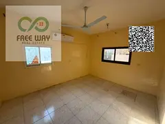 For annual rent in Al Nuaimiya: 2 bedrooms and a living room with a rooftop terrace; spacious areas.