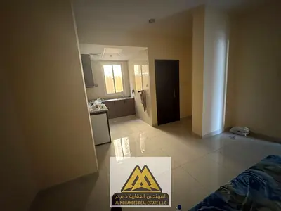Ground-floor studio in Al Rawda 2, Ajman, split AC, close to services. AED 23K/year, 4 payments, non-cashed security cheque.