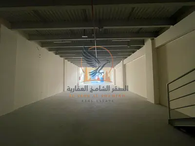 Showroom with a total area of 3,822 sq ft, including 2,211 sq ft ground floor + 1,611 sq ft mezzanine, with a bathroom and modern fire system