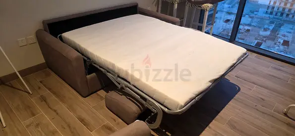 Like new Condition Italian Two Seater Sofa bed