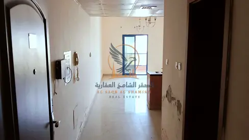 Studio for annual rent featuring a spacious layout a private parking space and a balcony with an open view It includes a large open
