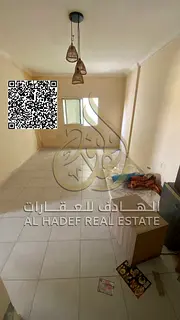 A room and a lounge with a balcony in Al Nuaimiya on Al Ittihad Street, next to Gift Way and near Da