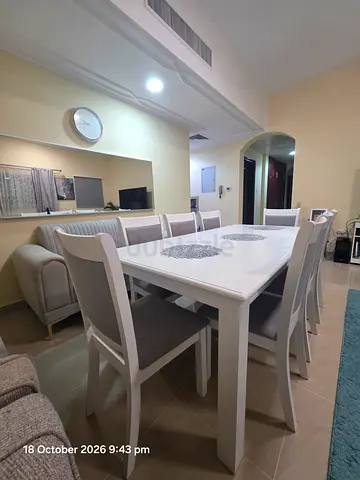 White 8-Seater Dining Table with Upholstered Chairs (Exellent Condition)