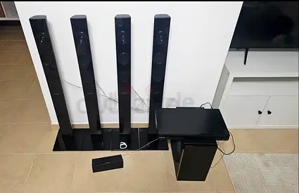 5.1 Home Theater Speaker System with Subwoofer and DVD Player - Good Condition