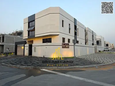 A villa with a price including registration and ownership fees on the main street, ready for living in the most prestigious areas of Ajman, freehold f