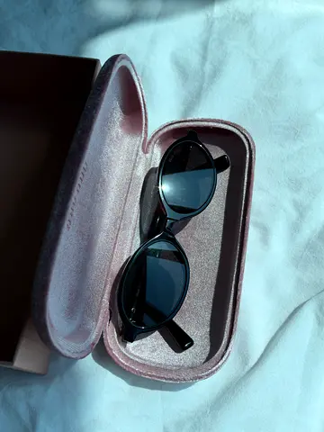 Miu Miu oval sunglasses, authentic (have a check)