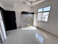 Brand-new two-bedroom apartment, first occupancy, for annual rent in Al Rashidiya 2, with an open vi