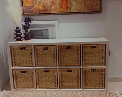 White storage cabinet with 8 wicker baskets - good condition