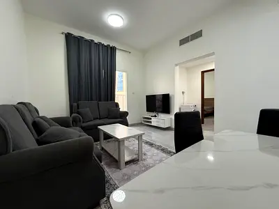 One-bedroom apartment (with a living room), second-tenancy, located behind the Corniche Towers; utilities included.