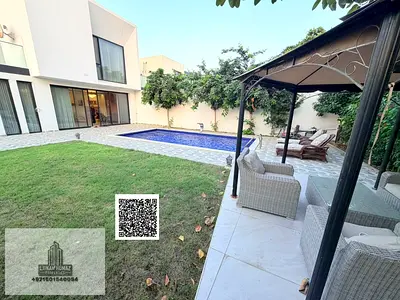Villa for sale in Ajman, Al-Zawraa area. 4 master bedrooms, majlis, living room, and maid's room. Bank financing available.