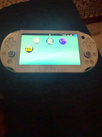 Sony PS Vita handheld console - white x teal slim model
