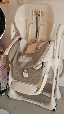 Used adjustable baby high chair with removable tray - good condition