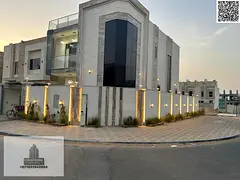 Villa for sale in Al Zahia, Ajman. Features 5 master bedrooms, a majlis, a living area, and a maid