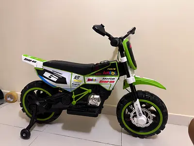Child's Green Electric Ride-On Motorbike with Training Wheels - Good Condition
