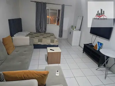 In Al Taawun, Sharjah: A fully furnished studio (high-end, "super-lux" finish). This is a second-occupancy unit, featuring a room, a separate kitchen,