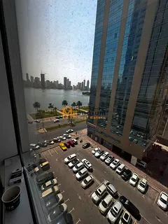 Office for Annual Rent in Al Majaz 1 Sharjah, 1,400 Sq Ft, 4 Separate Rooms, Side Water View, Free A