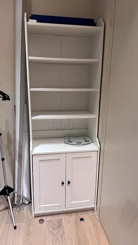 Shoe cabinet with open shelves and lower cupboard