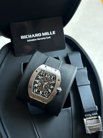 Richard Mille RM 67-01 Extra Flat automatic watch in titanium, accompanied by its presentation box a