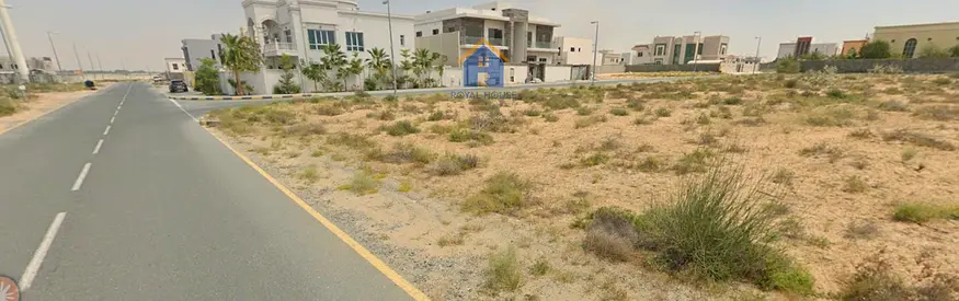 Investment Land for Sale in Mleiha – 5,005 sq ft, Two Streets, Next to Public Park