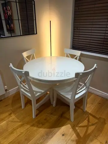 IKEA extendable dining table and 4 chairs for sale
