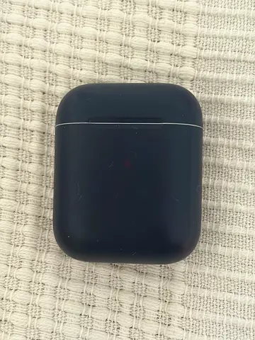 Wireless earphones charging case with dark silicone cover (fits AirPods)