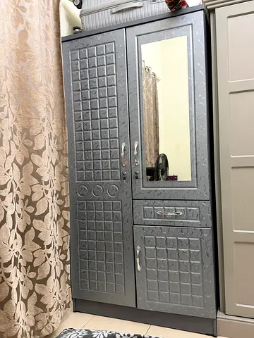 Grey wardrobe/armoire with shelves and hanging rail - used