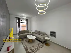 Luxury apartment (second occupancy), featuring one bedroom and a living room with an open view. in A