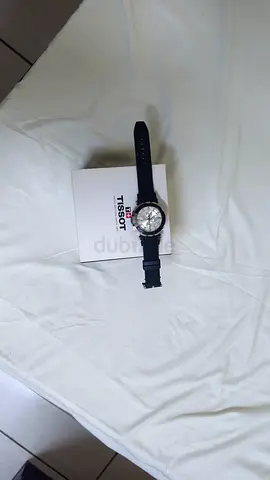 Tissot men's automatic wristwatch with box — not used